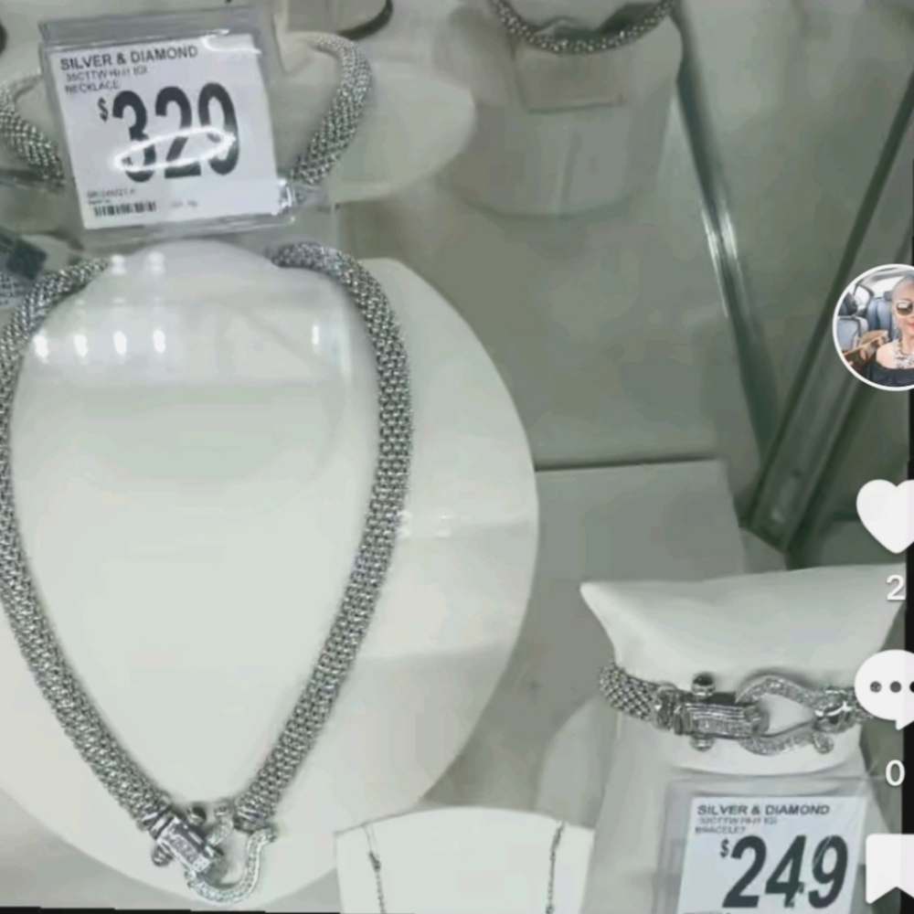 A beautiful silver and diamond necklace and matching bracelet set. Gently worn.